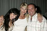 Daniella Rich, Marcy and  Michael Warren at the after party for the movie premiere of 'RIDING GIANTS' at the Southampton home of Andrew Rosen on 7-2-04<br>photo by Rob Rich copyright 2004  516-676-3939