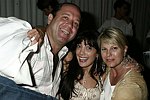 Michael Warren, Daniella Rich, and Marcy Warren at the after party for the movie premiere of 'RIDING GIANTS' at the Southampton home of Andrew Rosen on 7-2-04<br>photo by Rob Rich copyright 2004  516-676-3939