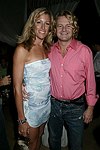 Eric Richman and Eiseley Morgan  at the after party for the movie premiere of 'RIDING GIANTS' at the Southampton home of Andrew Rosen on 7-2-04<br>photo by Rob Rich copyright 2004  516-676-3939
