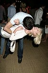 Fabian Basabe and Eiseley Morgan at the after party for the movie premiere of 'RIDING GIANTS' at the Southampton home of Andrew Rosen on 7-2-04<br>photo by Rob Rich copyright 2004  516-676-3939