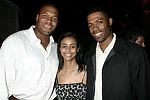 NY Giant Michael Strahan, Tirste' Lieteau, and Dr. Ian Smith<br>at the after party for the movie premiere of 'RIDING GIANTS' at the Southampton home of Andrew Rosen on 7-2-04<br>photo by Rob Rich copyright 2004  516-676-3939 