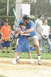 Leah and Stewart Lane at the Artist and Writer's Annual Softball game in Easthampton on 8-21-04.  photo by Rob Rich copyright 2004 516-676-3939  robwayne1@aol.com