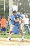 Leah and Stewart Lane at the Artist and Writer's Annual Softball game in Easthampton on 8-21-04.  photo by Rob Rich copyright 2004 516-676-3939  robwayne1@aol.com