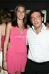 Starlight Berenson and CEO of La Perla Gianluca Flore on 5-30-04 at the Hamptons Magazine/La Perla party at Star Room in Wainscott.<br>photo by Rob Rich copyright 2004<br>516-676-3939<br>robwayne1@aol.com
