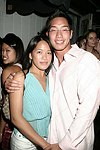 Michelle Sang and Jason Tom  at the after party for the G&P foundation at the Star Room on 7-10-04  photo by Rob Rich copyright 2004 516-676-3939 robwayne1@aol.com